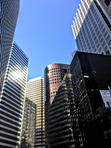 low angle photography of high rise buildings