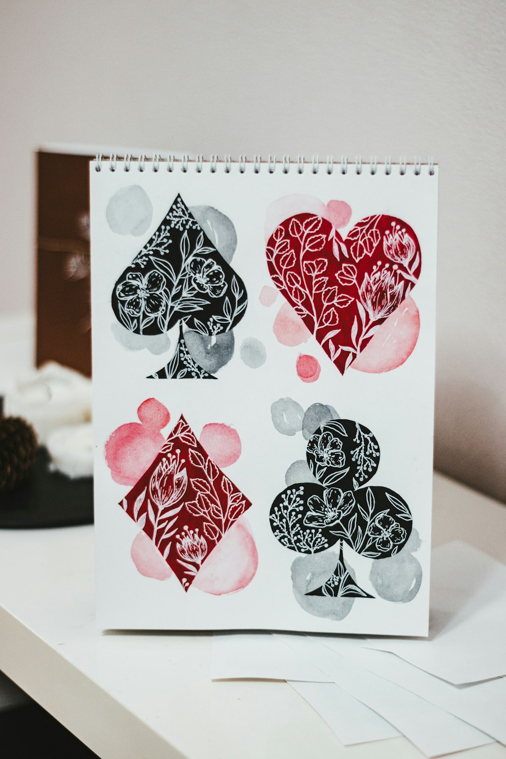 white red and black floral card