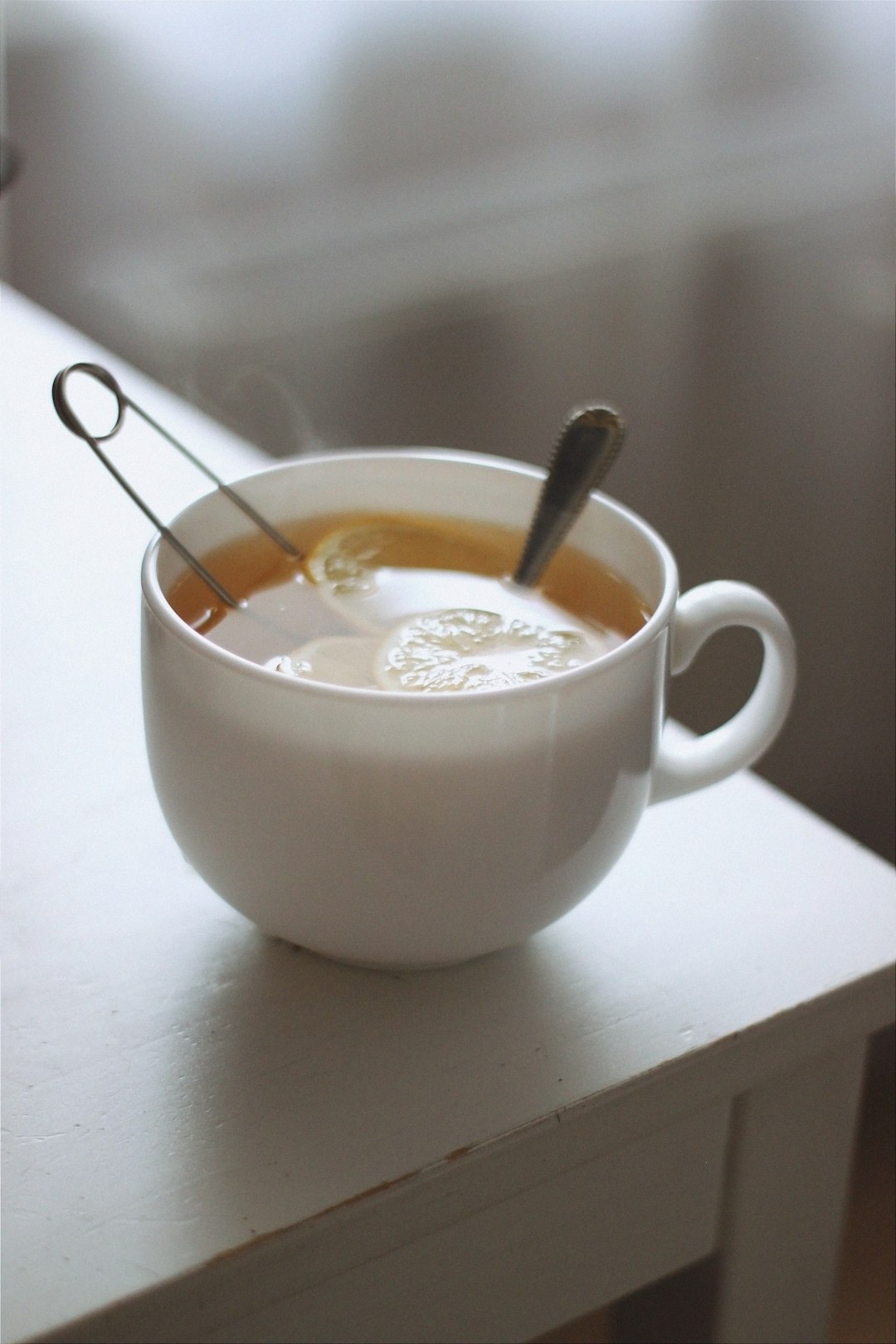 white ceramic mug with coffee