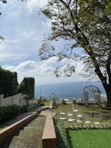 A lush garden view set for a beautiful outdoor event.