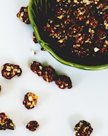 A vibrant spread of ethico eat's caramel popcorn in eco-friendly packaging on a wooden table