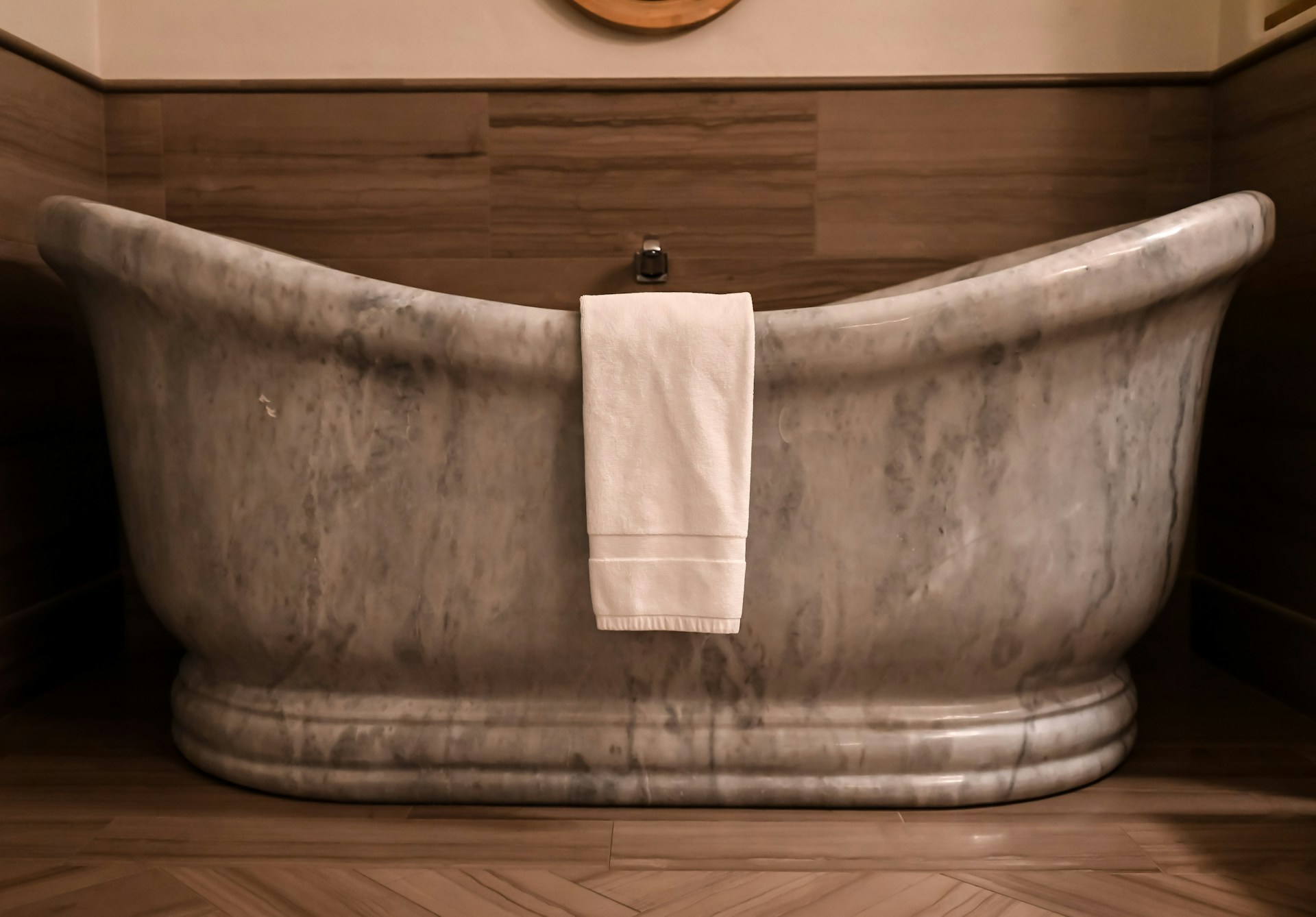 white and blue bathtub with water