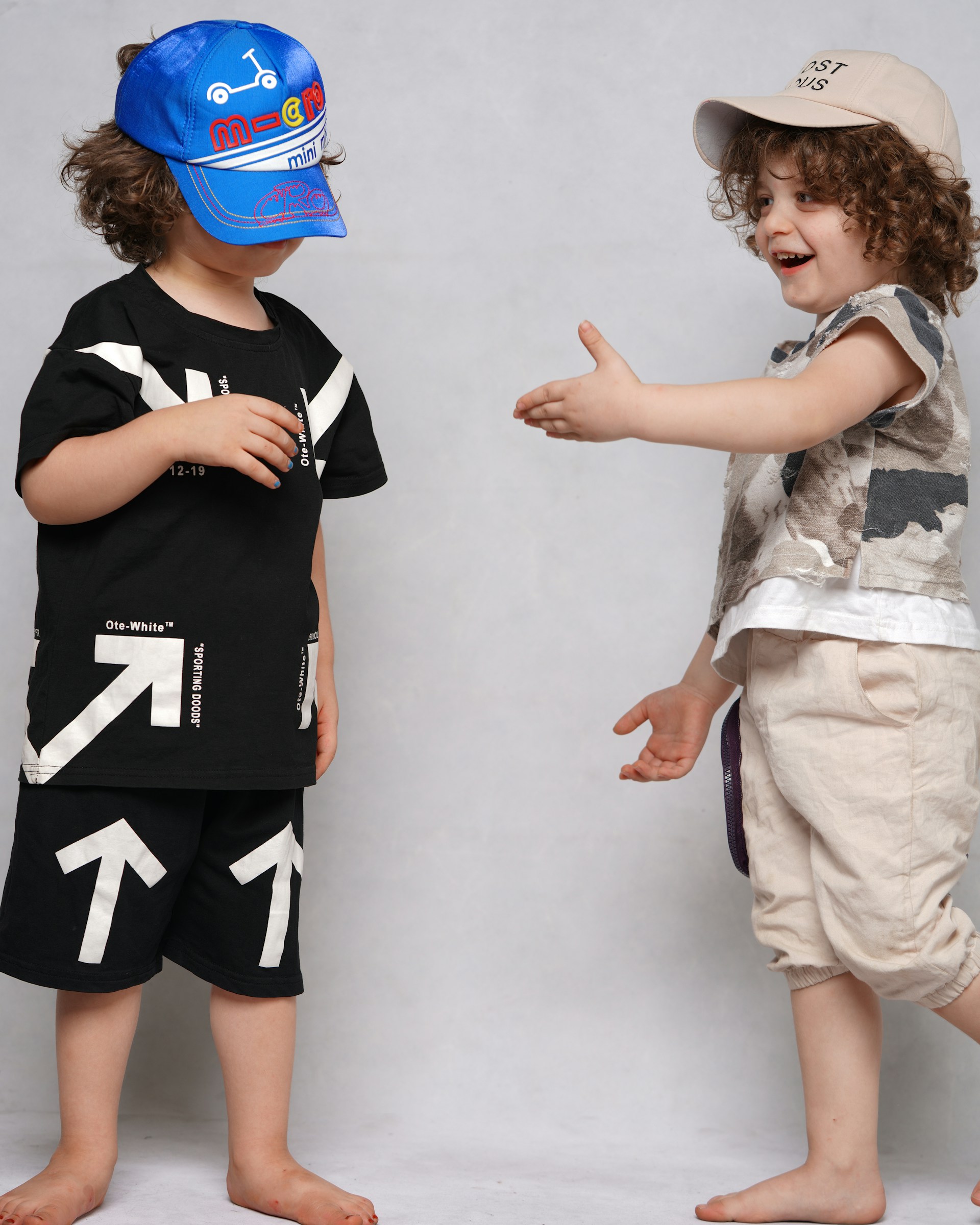 girl in black and white t-shirt and white shorts