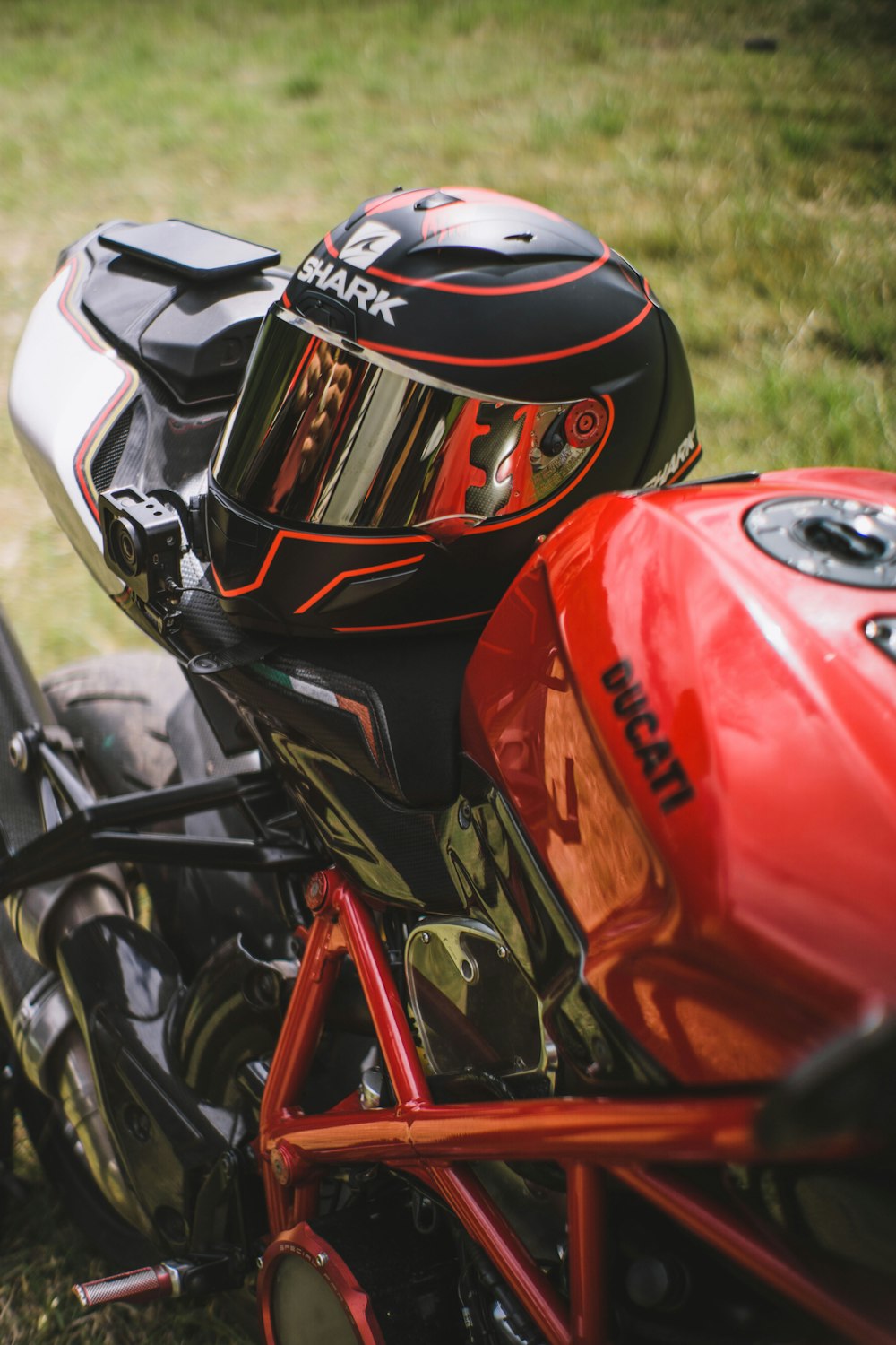 red and black motorcycle helmet
