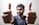 man in gray crew neck shirt making thumbs up