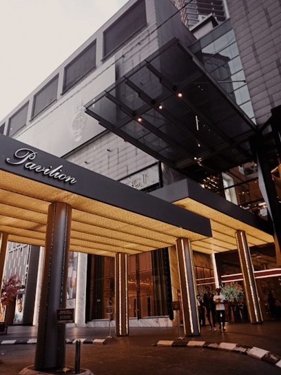 brown wooden framed glass window building