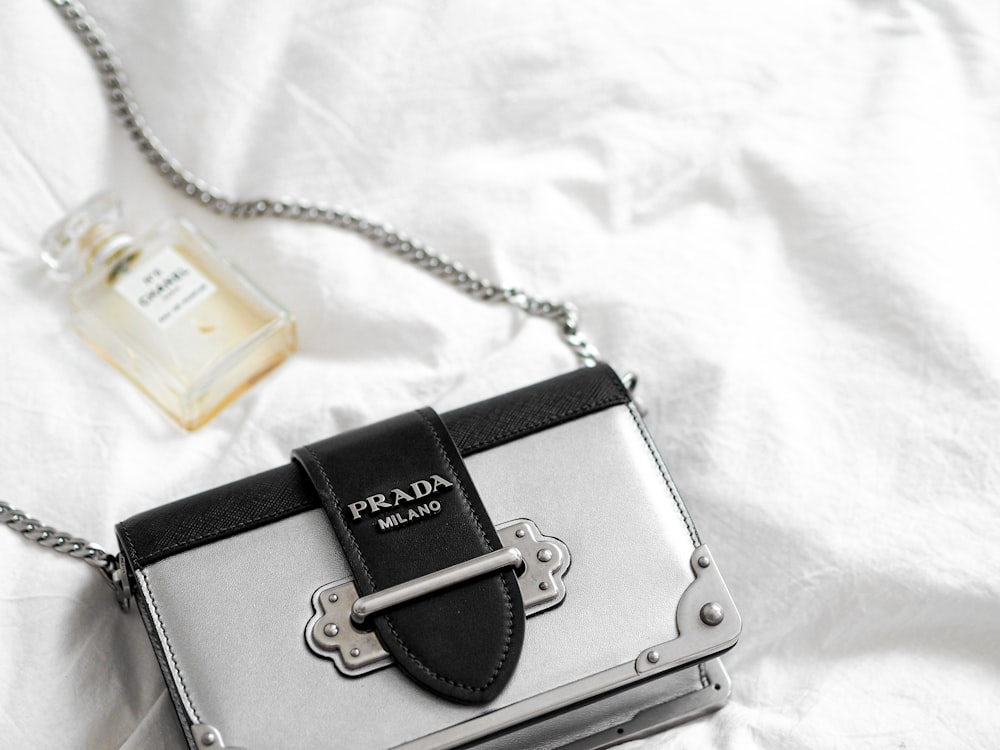 silver and black leather bag