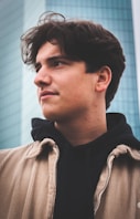 man in black and white striped shirt