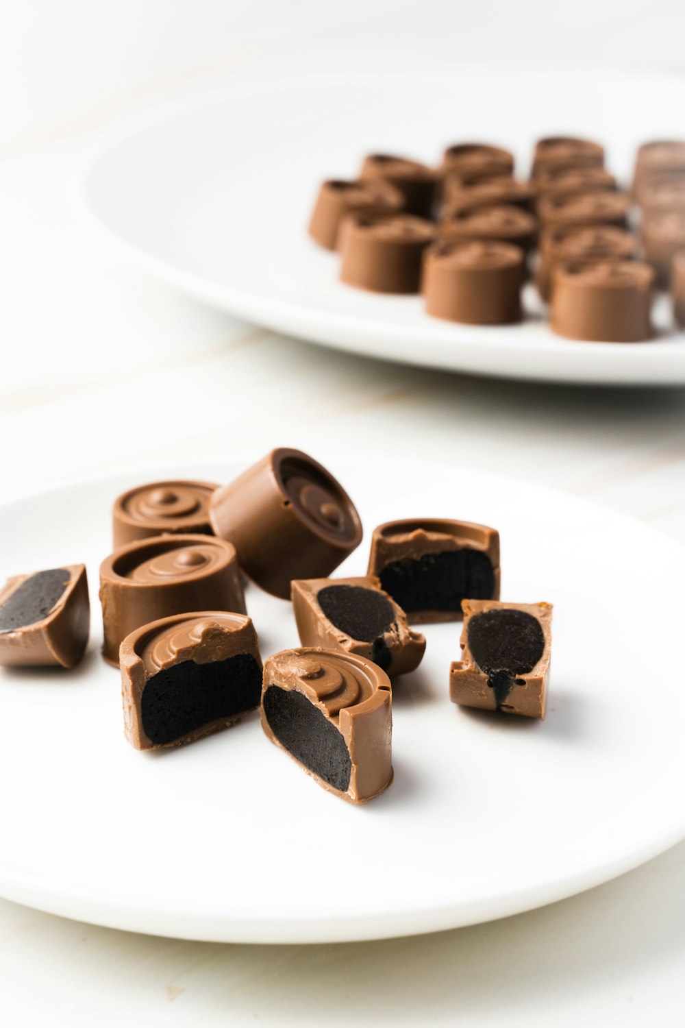 chocolate bars on white ceramic plate