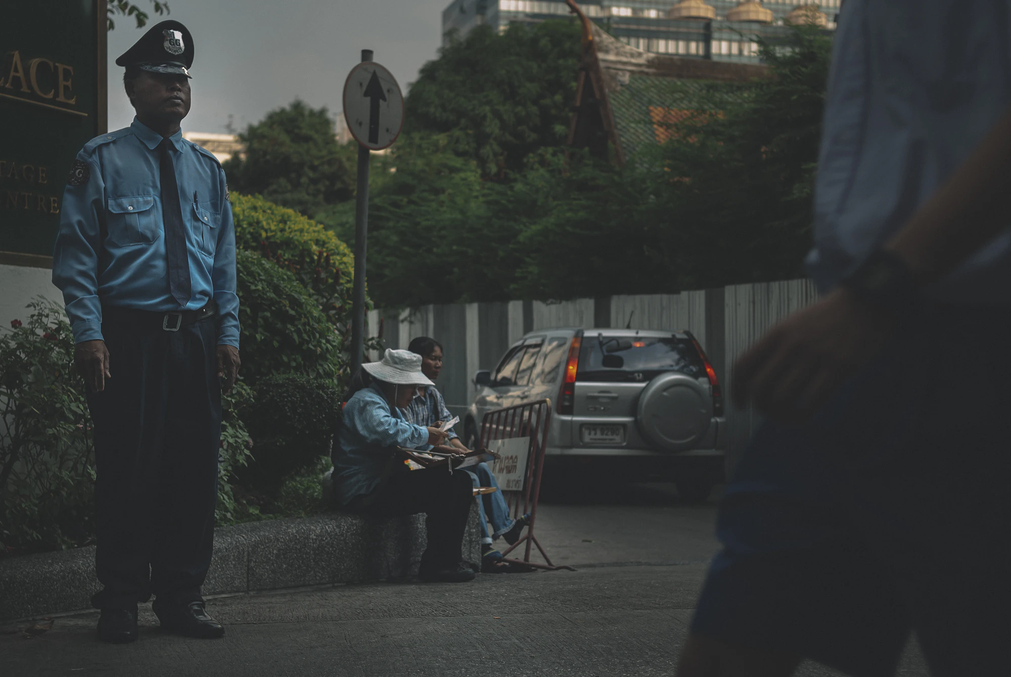A uniformed officer on a Bangkok street — guide to being arrested in Thailand