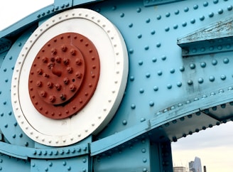 red round plastic on blue metal frame