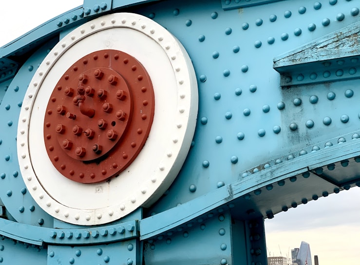 red round plastic on blue metal frame