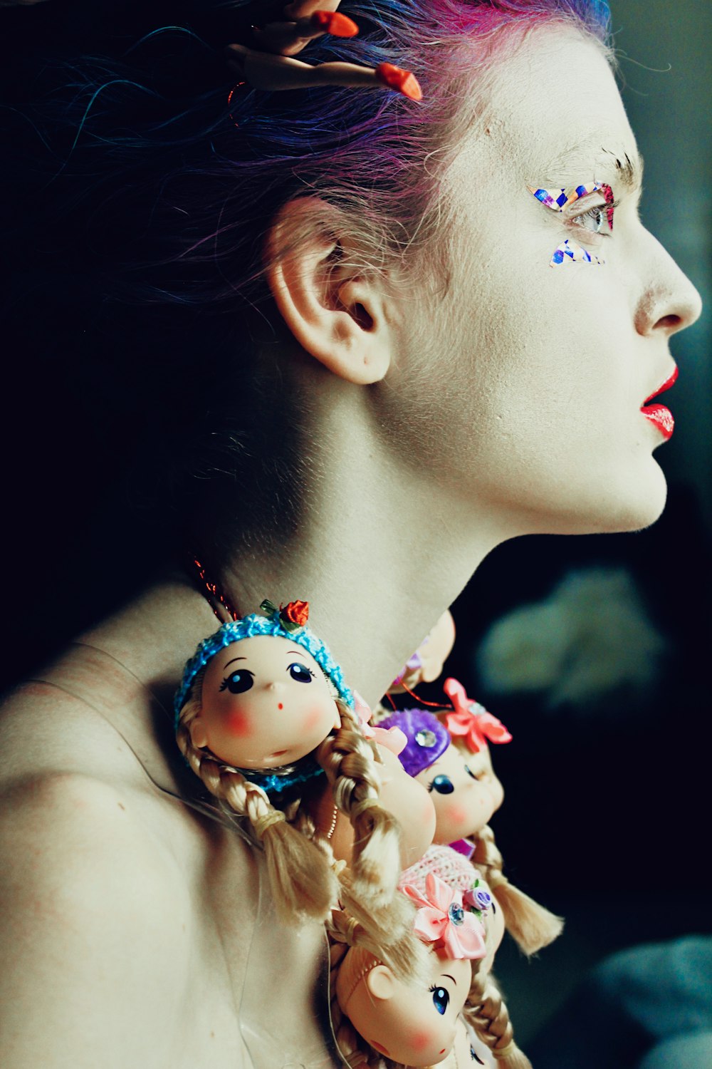 girl with pink and yellow floral hair accessory