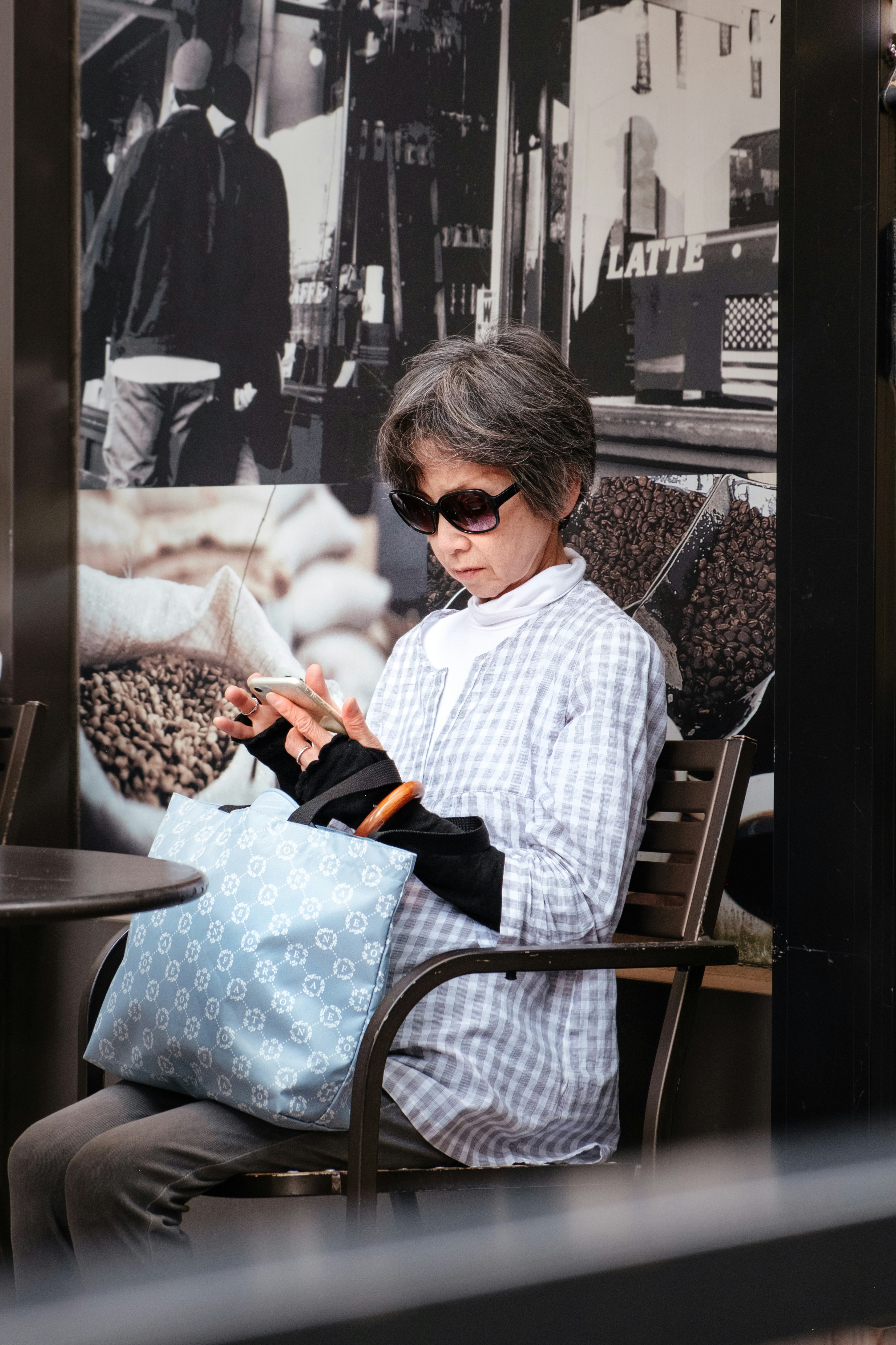 Senior using vision monitoring devices at home during an eye screening test