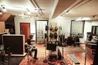 people playing musical instruments inside room