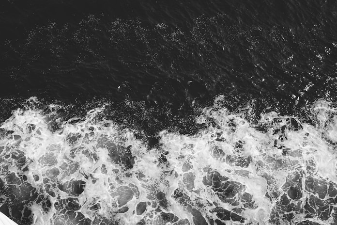 water splash on black and white