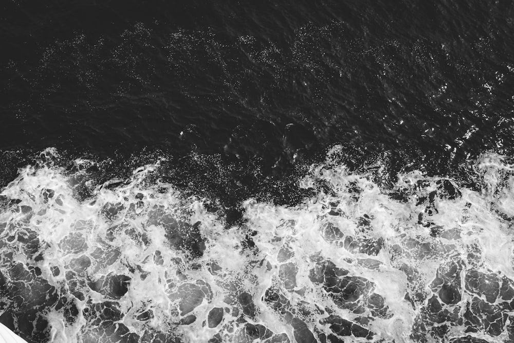 water splash on black and white