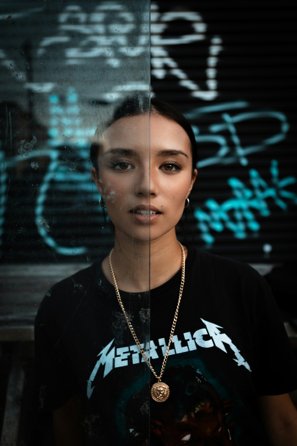 woman in black crew neck shirt wearing silver necklace