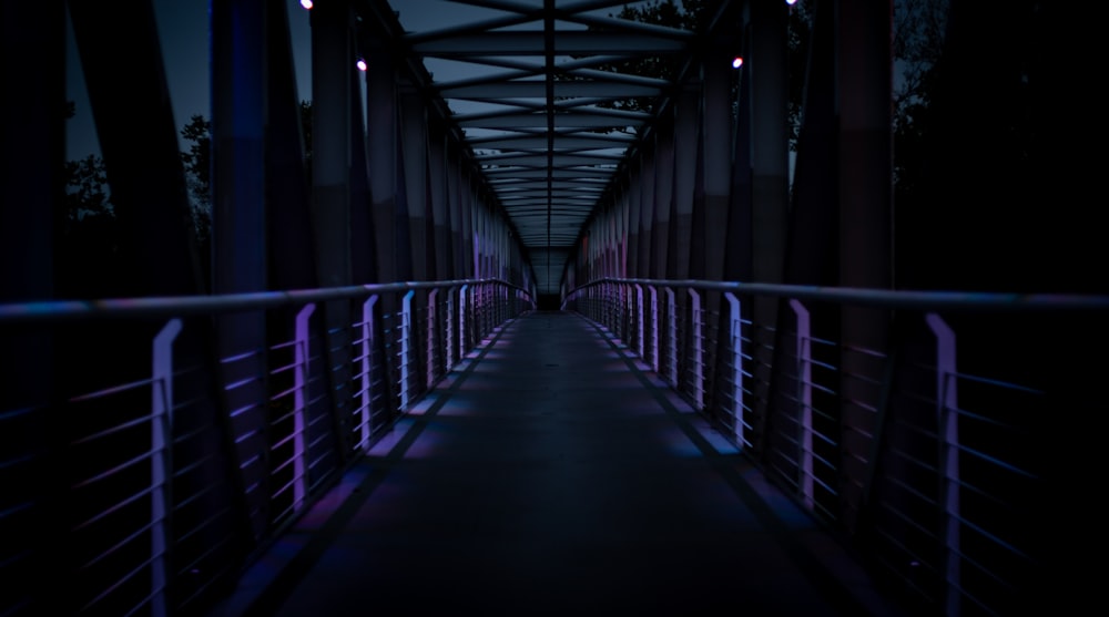 blue metal bridge during daytime