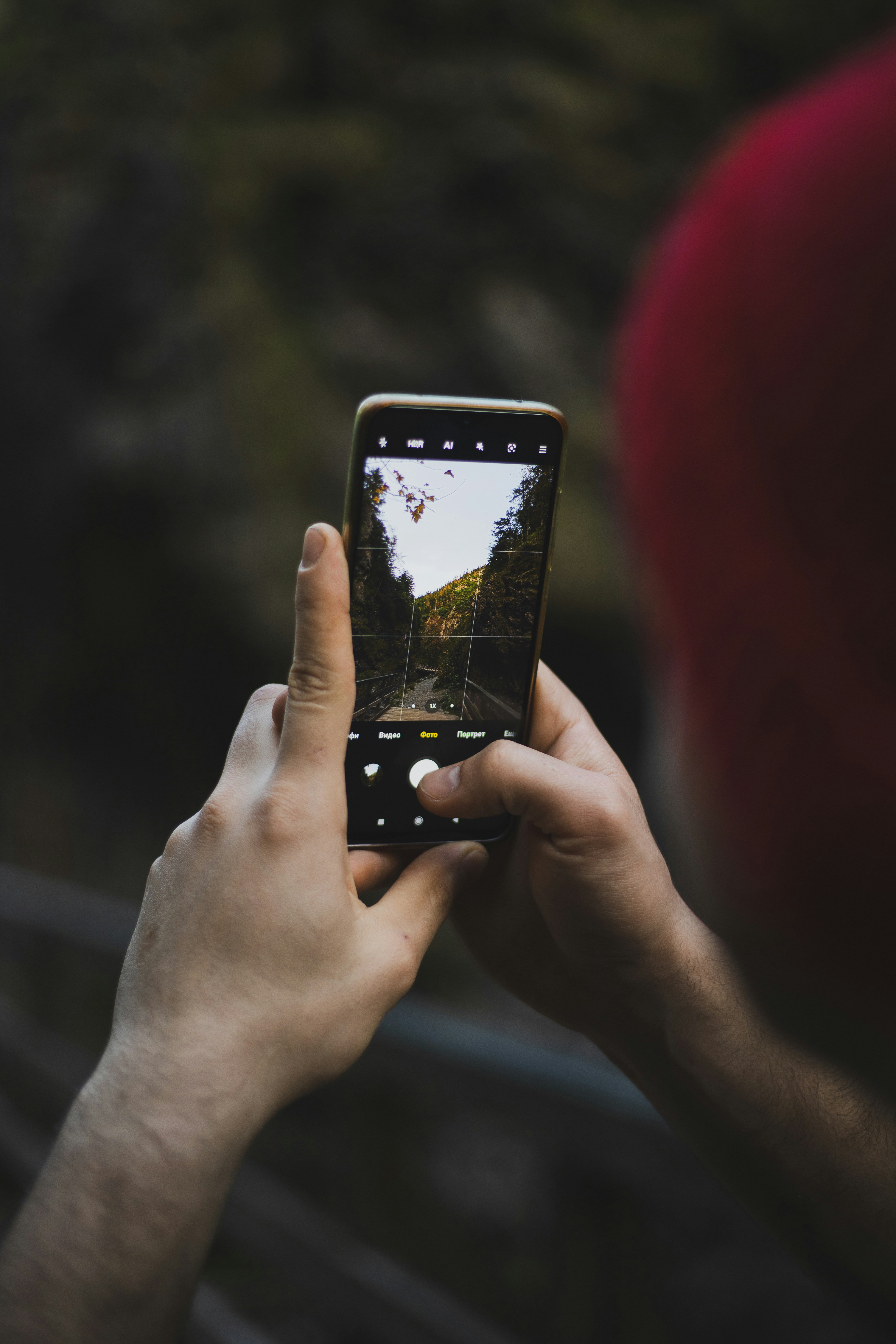 person-holding-black-iphone-5