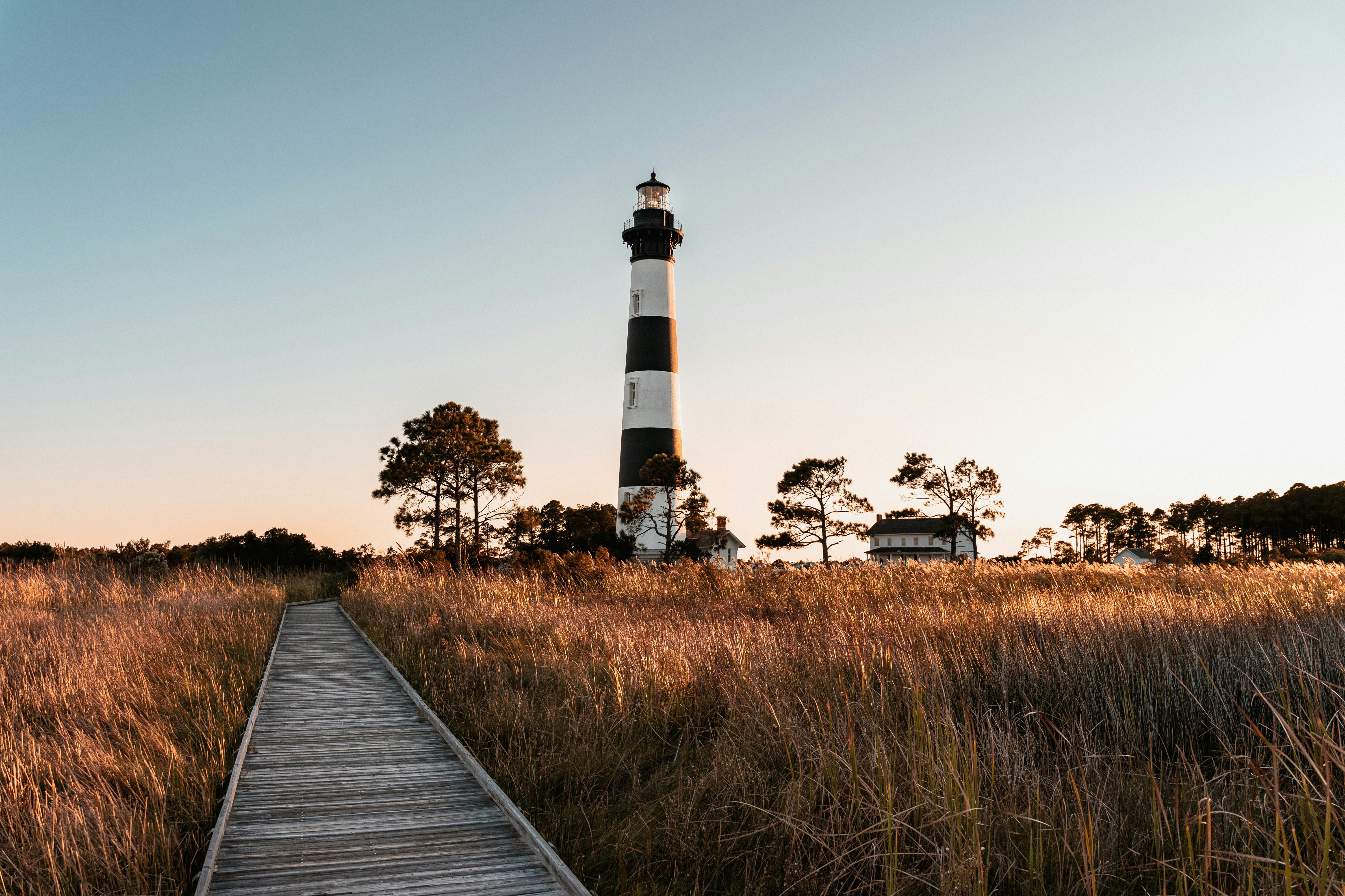 Taken during golden hour at Bodie Island Lighthouse in Nags Head, North Carolina. This is one of several lighthouses in the Outer Banks. (IG: @kyletriesphotography)