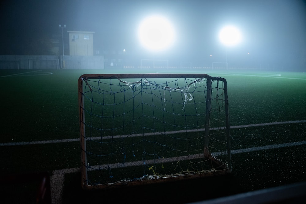 white and blue soccer goal net