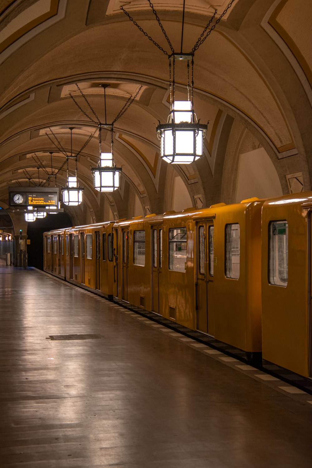 yellow train in train station