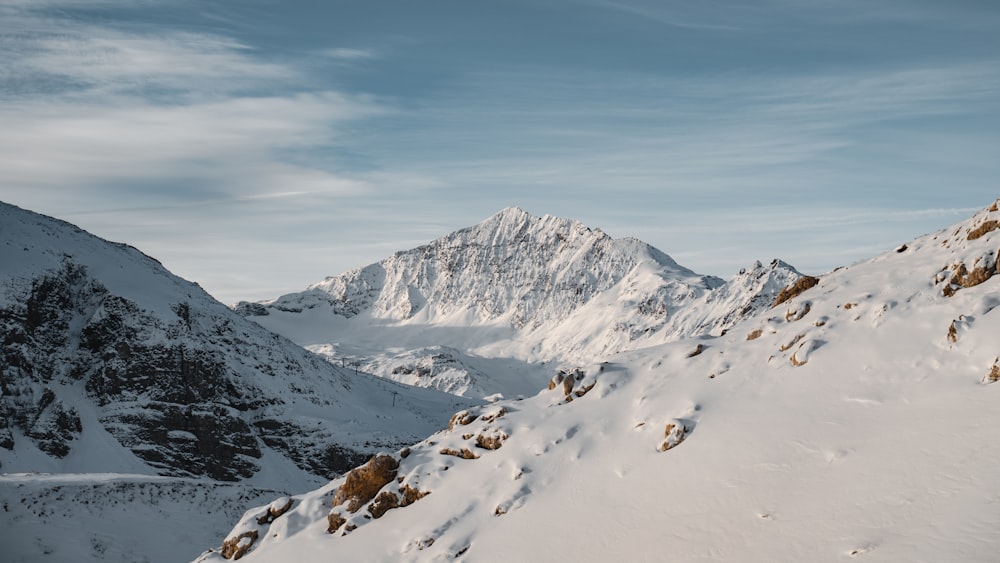 snow covered mountain under blue sky during daytime