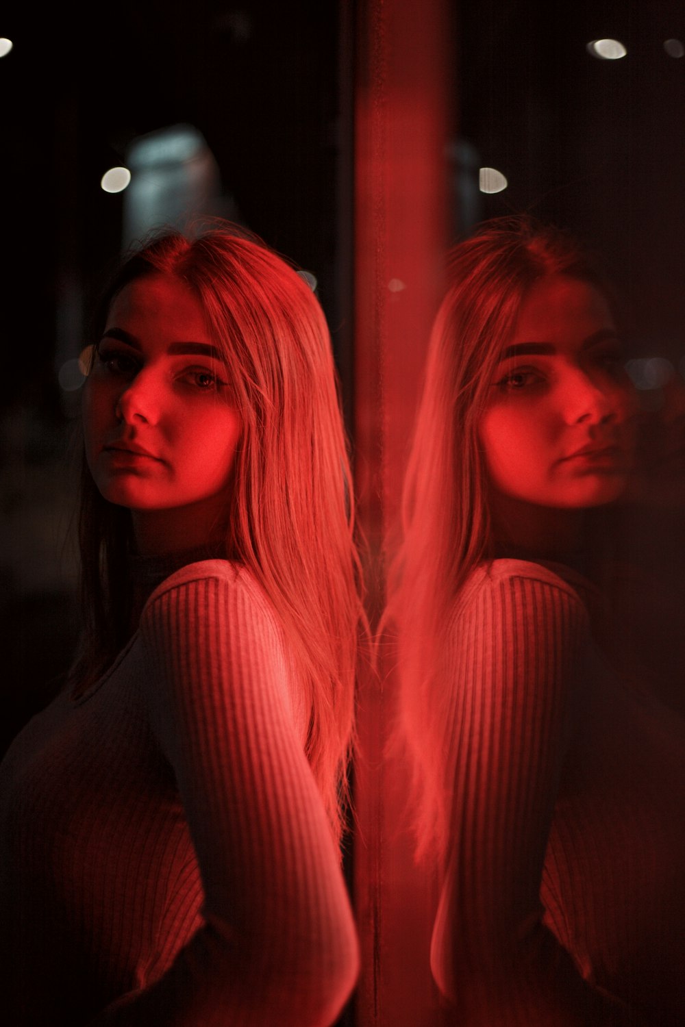 woman in red long sleeve shirt