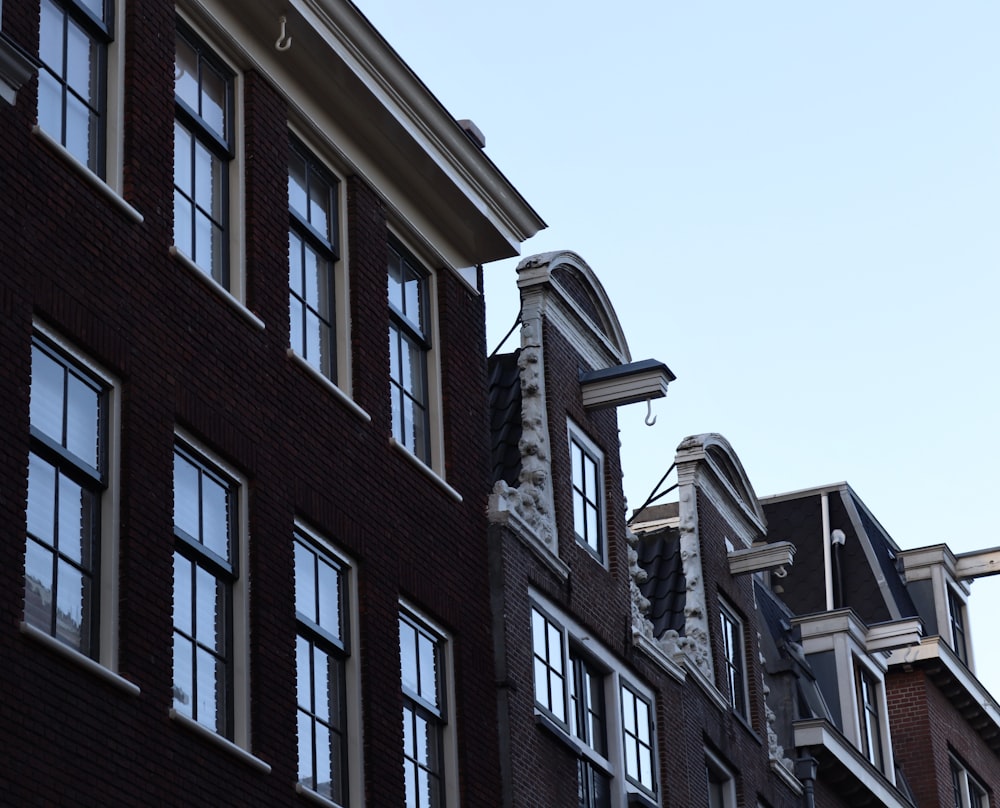 brown concrete building under blue sky during daytime