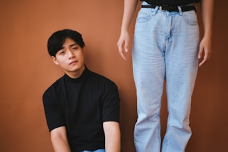 A calm mediator peacefully resolving a conflict between two people in a public space.