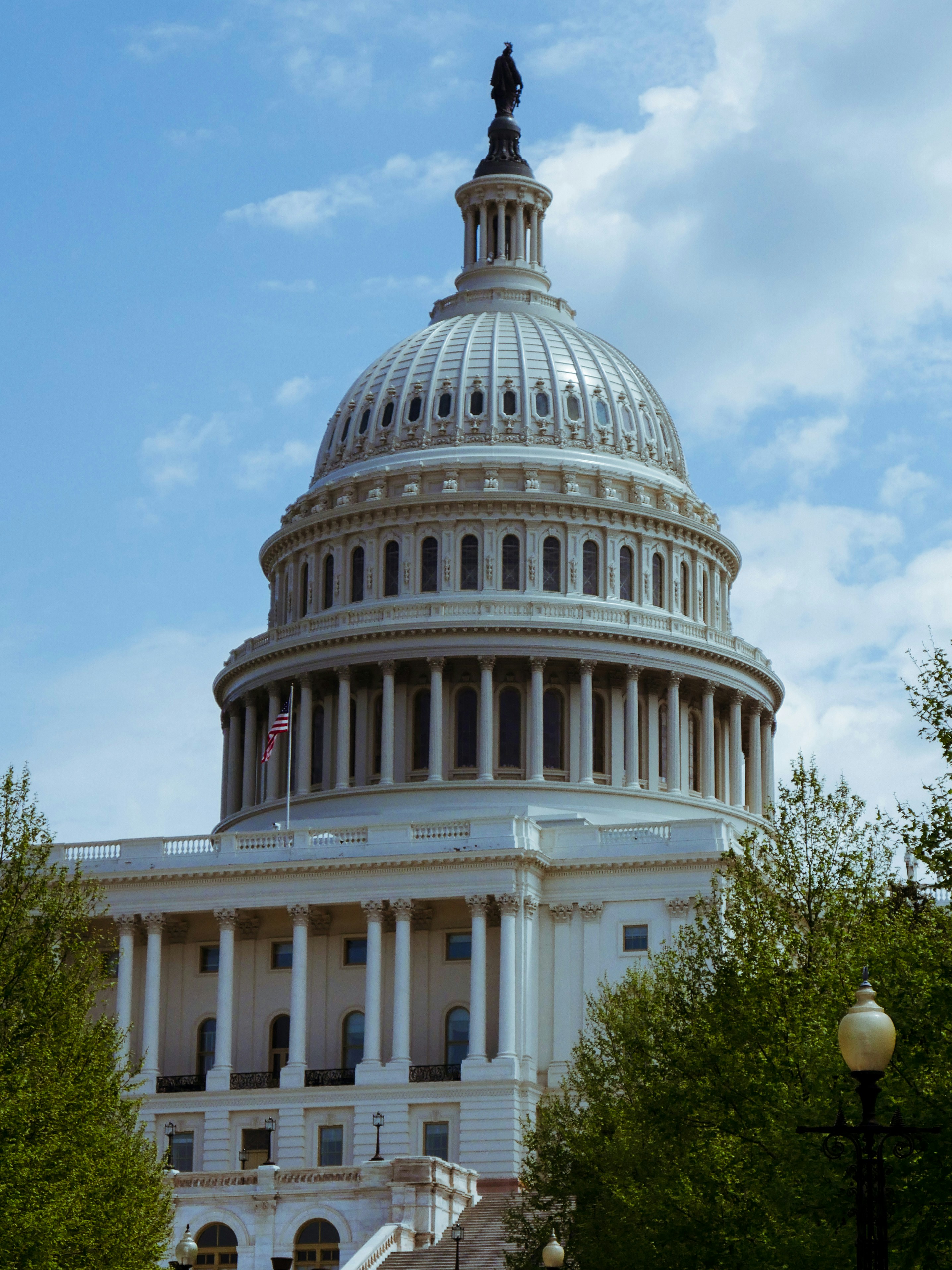 white concrete building under blue sky during daytime