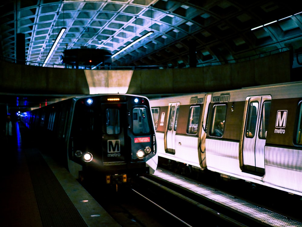 white and red train in train station