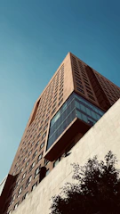 brown concrete building under blue sky during daytime