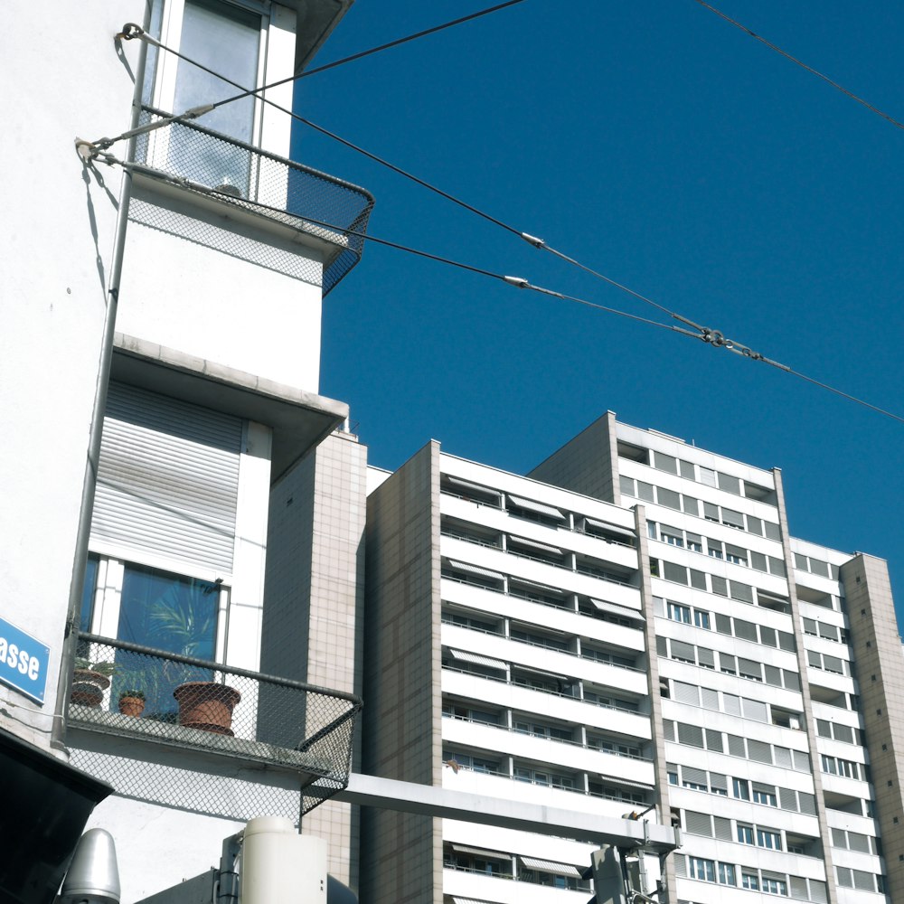 white concrete building under blue sky during daytime