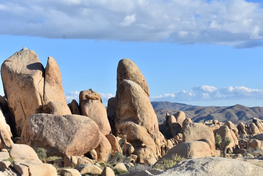 brown rock formation under blue sky during daytime