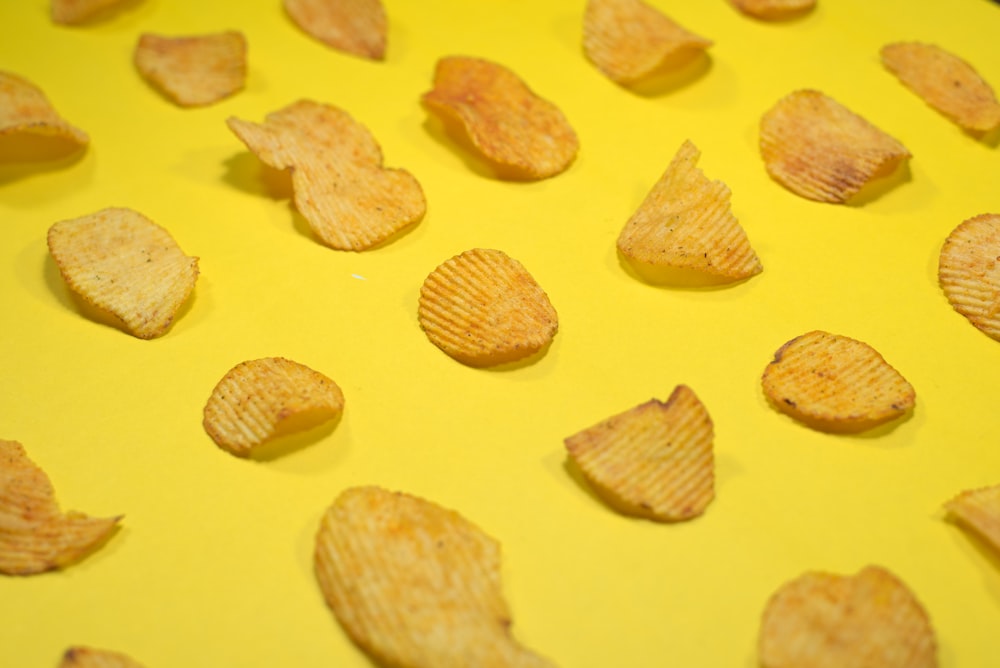 brown cookies on yellow surface