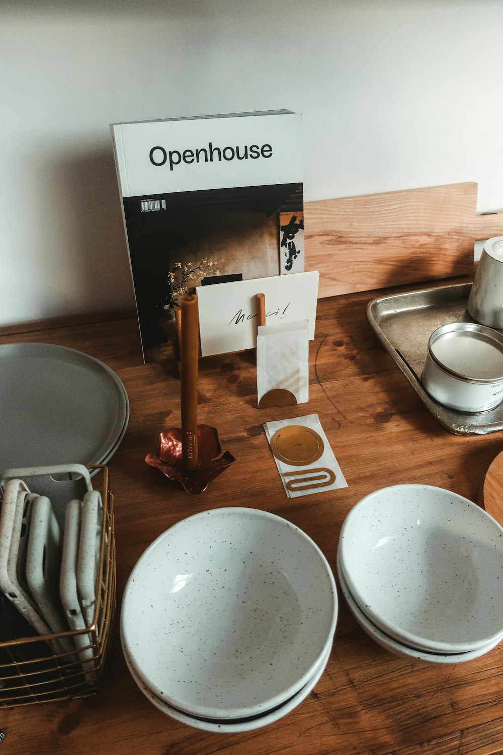 white ceramic bowl on brown wooden chopping board