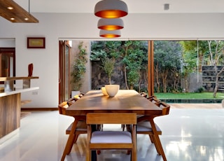 brown wooden table and chairs