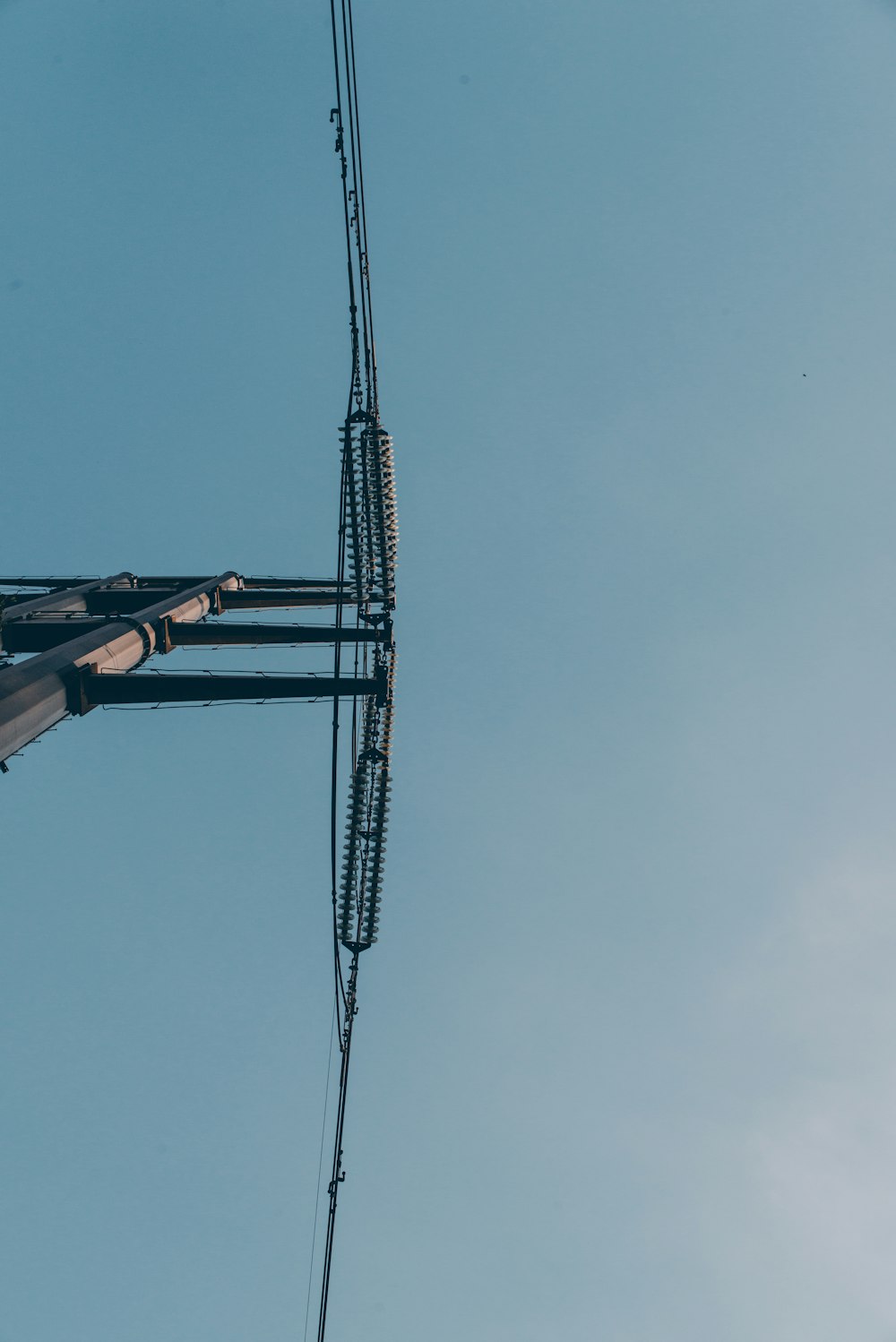 black cable car under blue sky during daytime