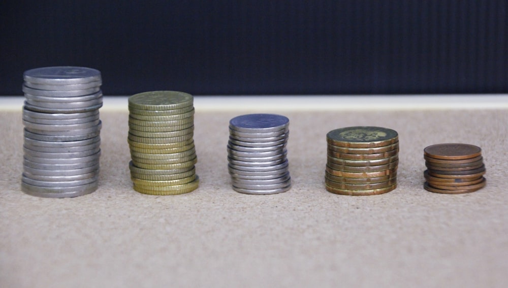 silver and gold round coins