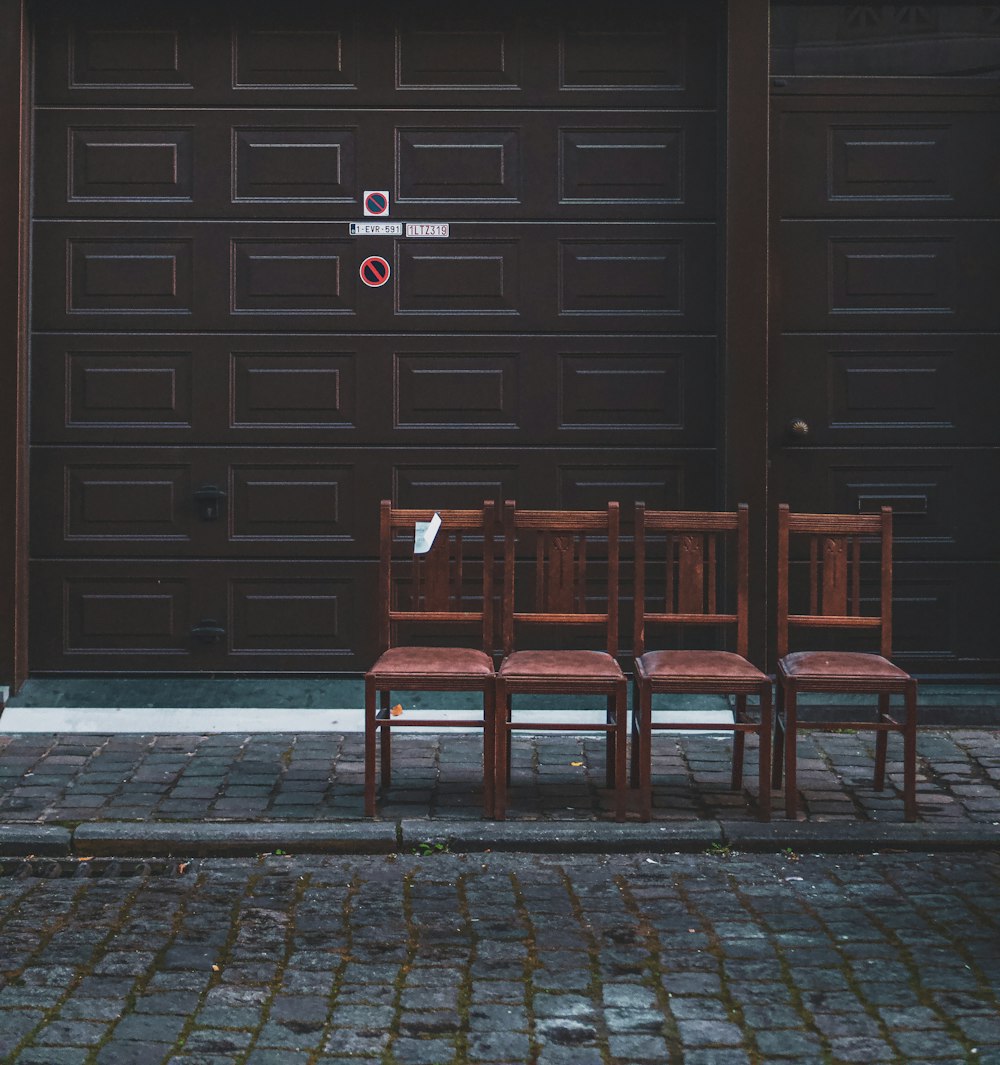 brown wooden chair on brown brick floor