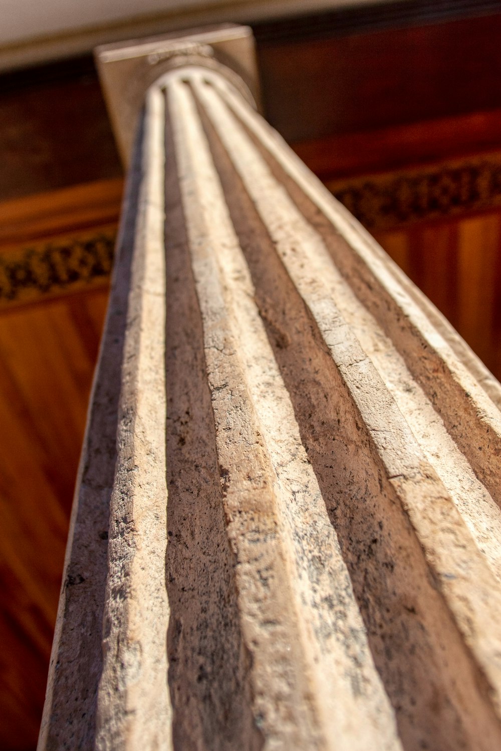 white and brown textile on brown wooden table