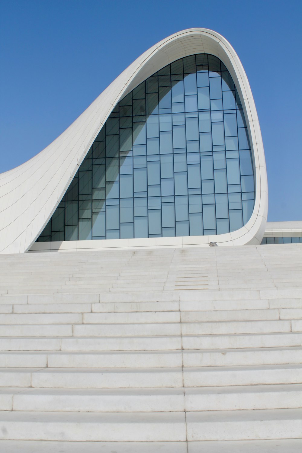 white concrete building under blue sky during daytime