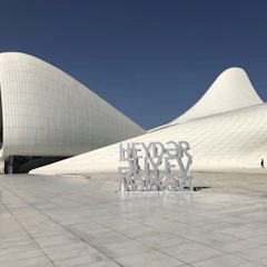 A sleek corporate website homepage with clean lines and modern typography.