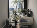 A cozy office corner with a view of Av Pedro Serafim Ferreira street.