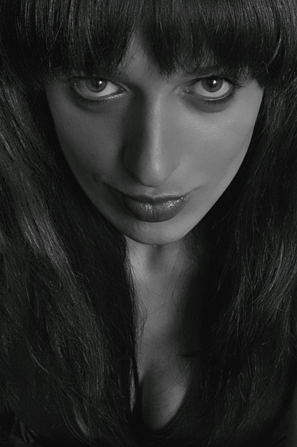 grayscale photo of womans face