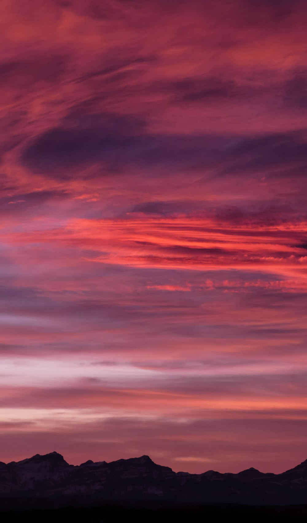 blue and white clouds painting