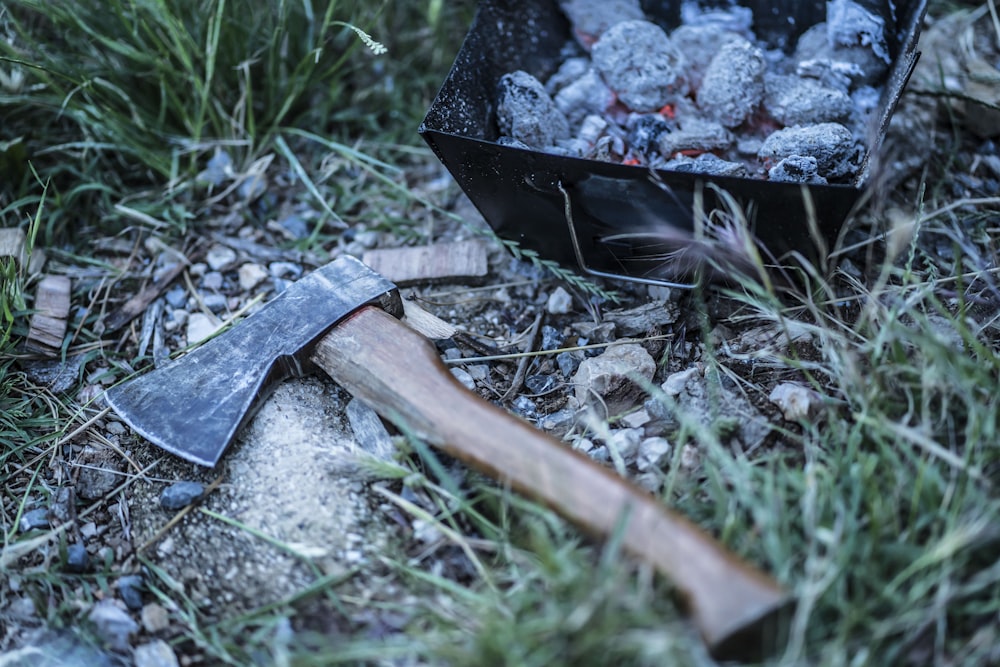 brown wooden handle knife on black round container