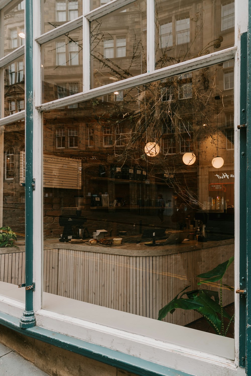 brown wooden framed glass window